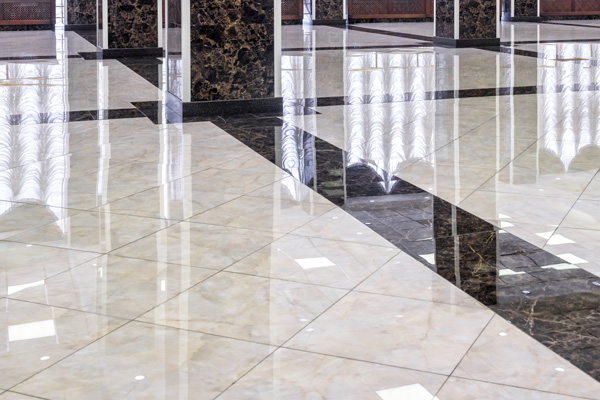 polished marble floor in an elegant interior showcasing a geometric pattern with reflections for luxury design
